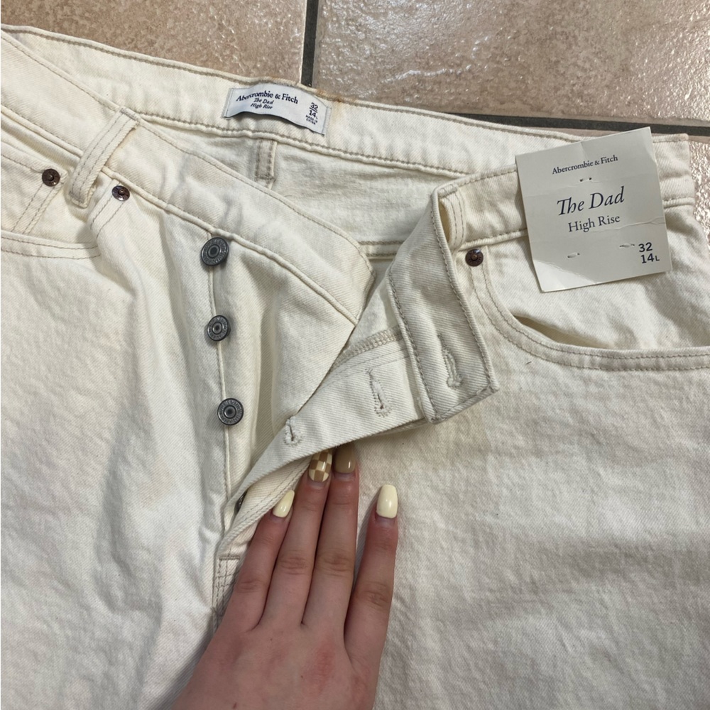 Cream coloured Ambercrombie jeans. Button up